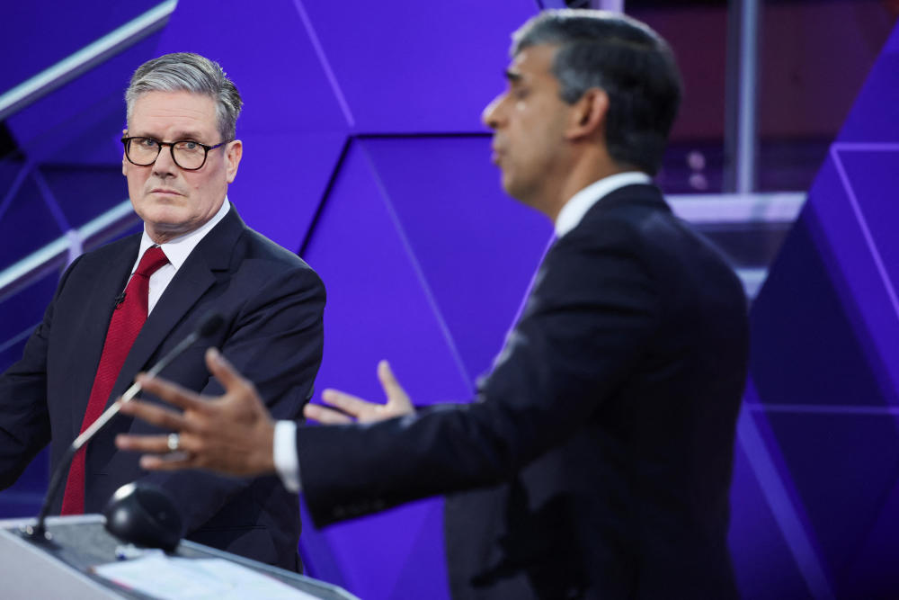 General Election campaign 2024. Labour leader Sir Keir Starmer and Prime Minister Rishi Sunak during their BBC Head-to-head debate in Nottingham. Picture date: Wednesday June 26, 2024. See PA story POLITICS Election. Photo credit should read: Phil Noble/PA Wire URN:76663805